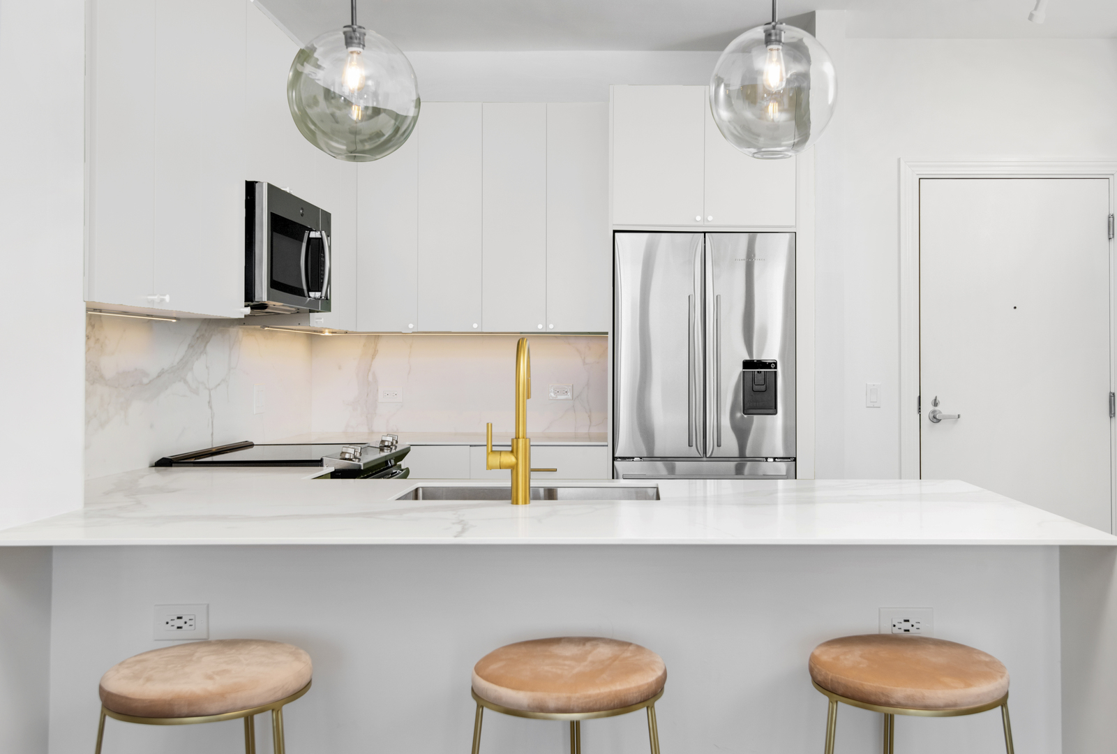1629 South Prairie Avenue, Unit 1602 Chicago, IL 60616 - Photo 9 of 23 a kitchen with a sink and a refrigerator