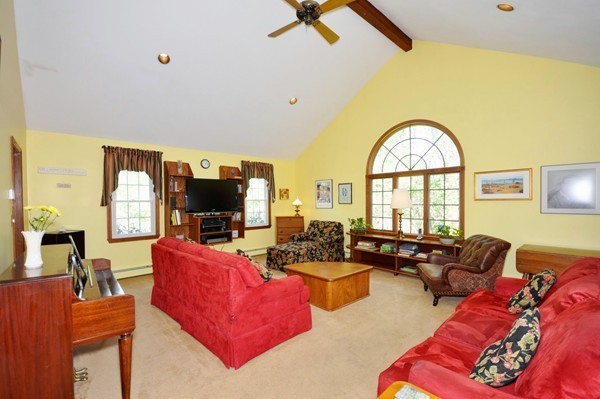 38 Spaulding Road Chelmsford, MA 01824 - Photo 5 of 14 a living room with furniture fireplace and a large window