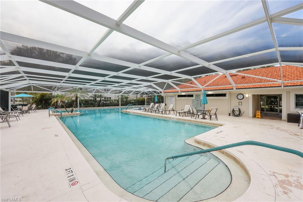 7465 Jacaranda Park Road, Unit R103 Naples, FL 34109 - Photo 37 of 46 Community Pool with Spa & Lap Lanes