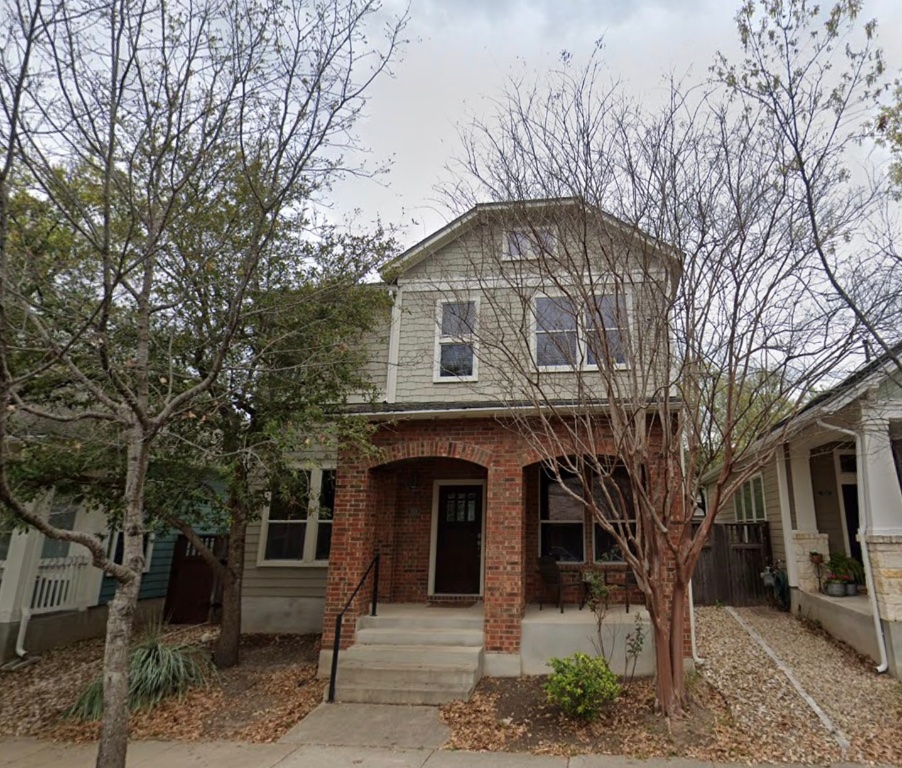 1924 Littlefield Street Austin, TX 78723 - Photo 1 of 19 a front view of a house with a tree