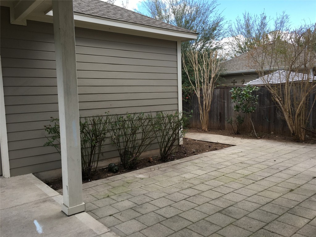 1924 Littlefield Street Austin, TX 78723 - Photo 10 of 19 a view of a house with backyard and trees