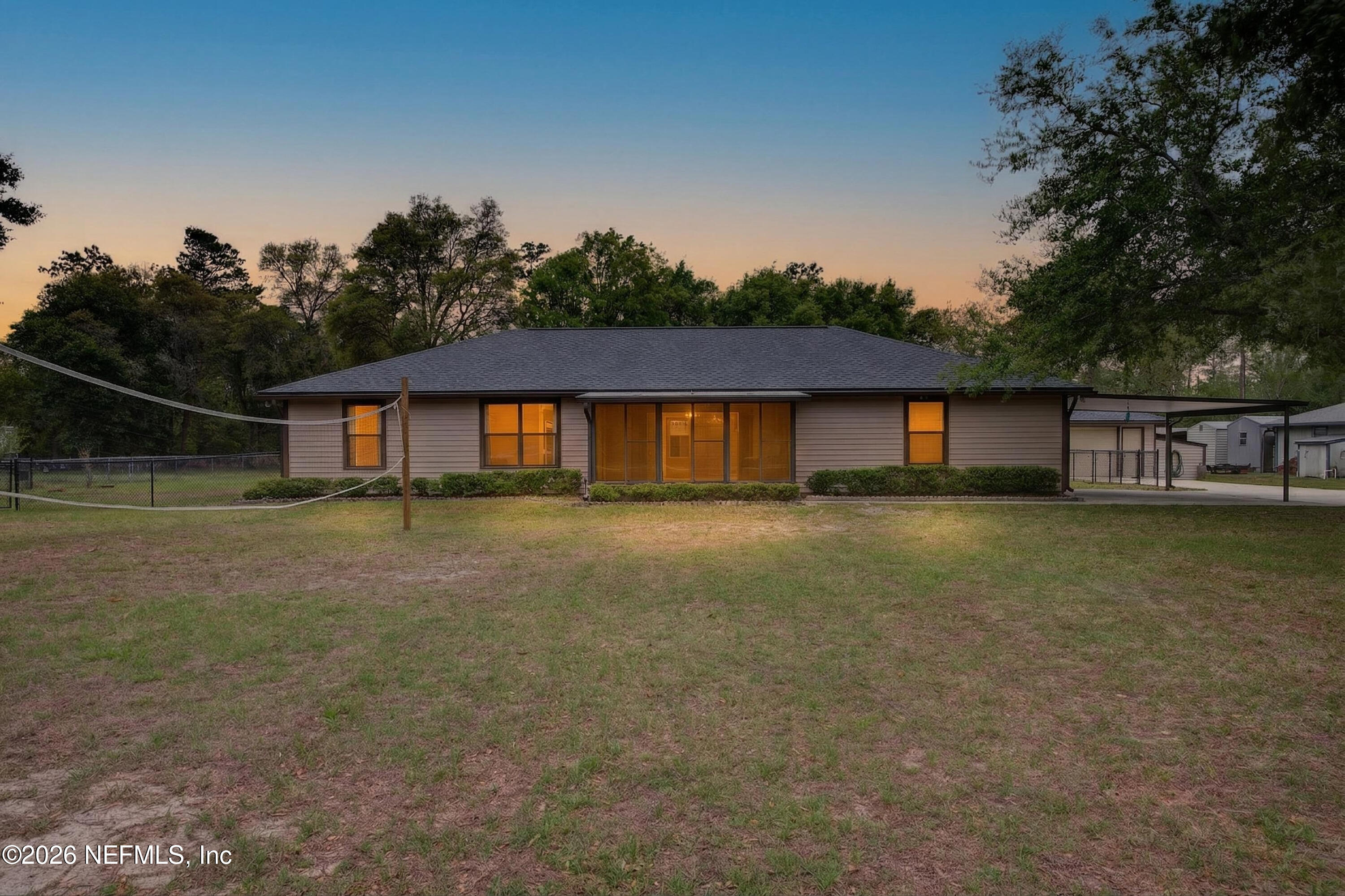 4537 Junction Drive Middleburg, FL 32068 - Photo 1 of 62 a front view of a house with a yard