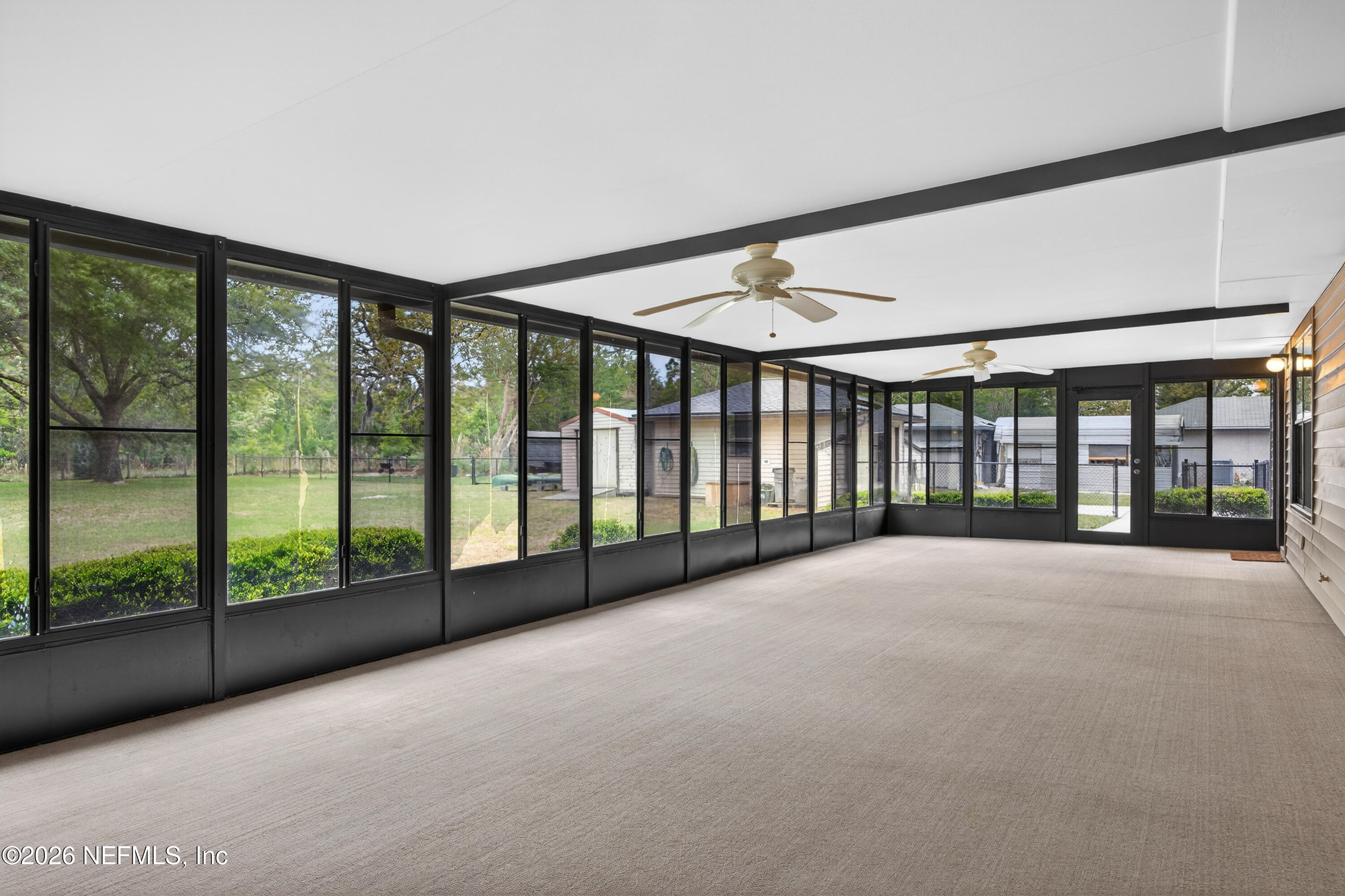 4537 Junction Drive Middleburg, FL 32068 - Photo 39 of 62 a view of an empty room with windows