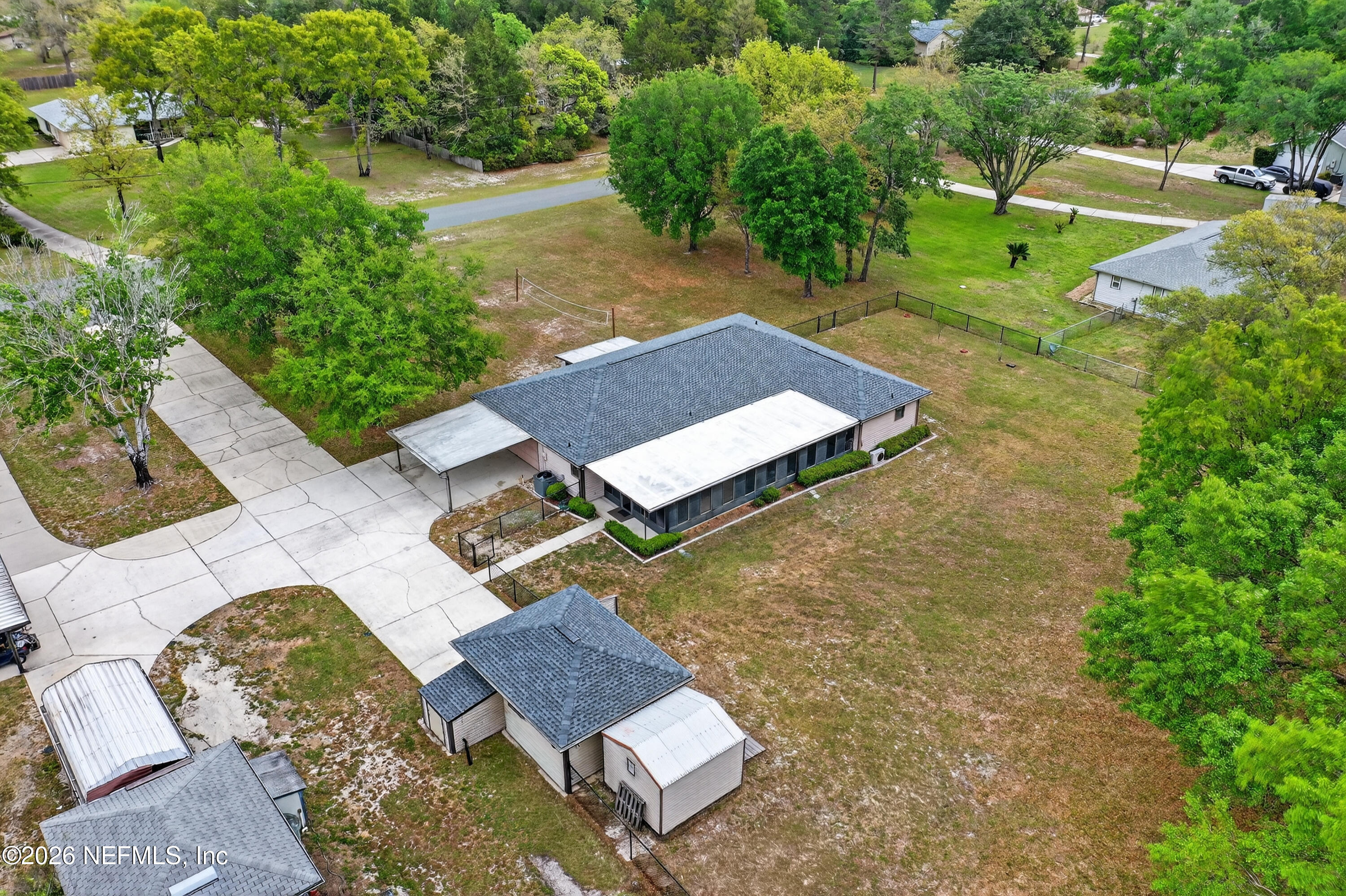 4537 Junction Drive Middleburg, FL 32068 - Photo 52 of 62 an aerial view of a house with a yard