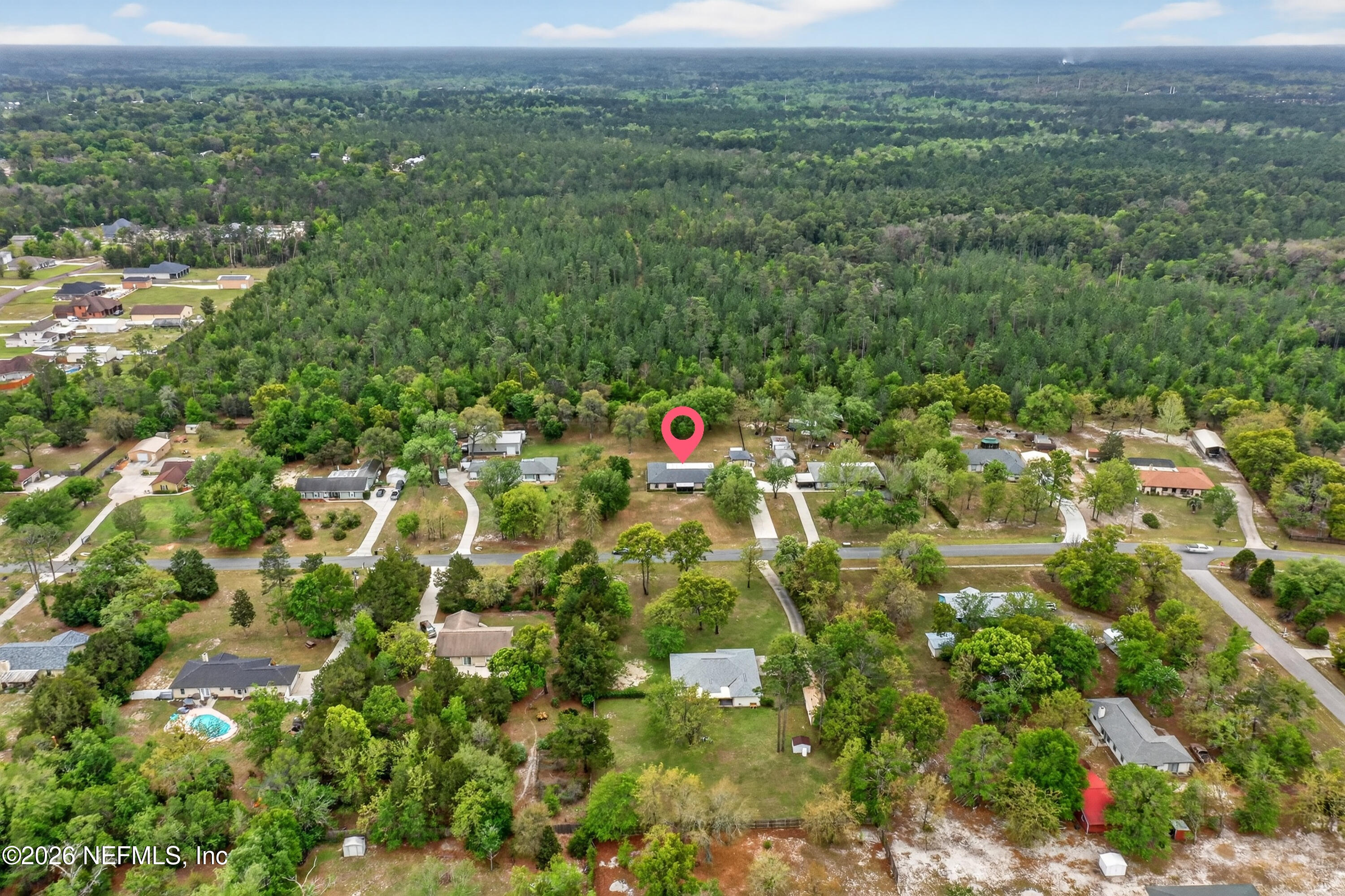 4537 Junction Drive Middleburg, FL 32068 - Photo 56 of 62 an aerial view of residential houses with outdoor space and trees