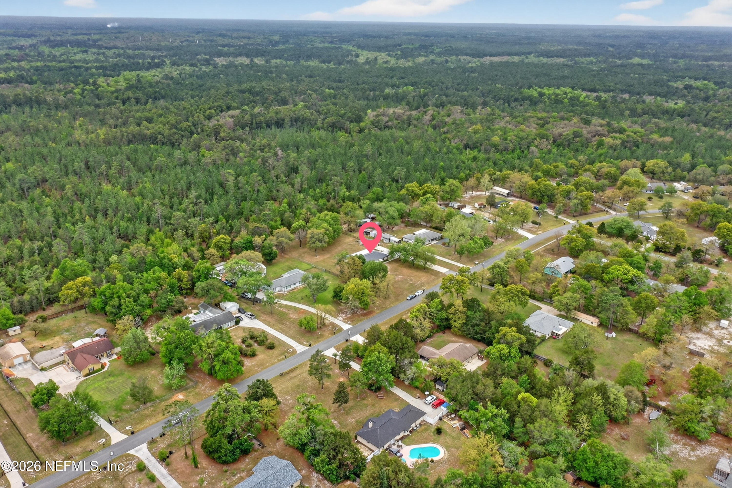 4537 Junction Drive Middleburg, FL 32068 - Photo 57 of 62 a view of a field with a tree