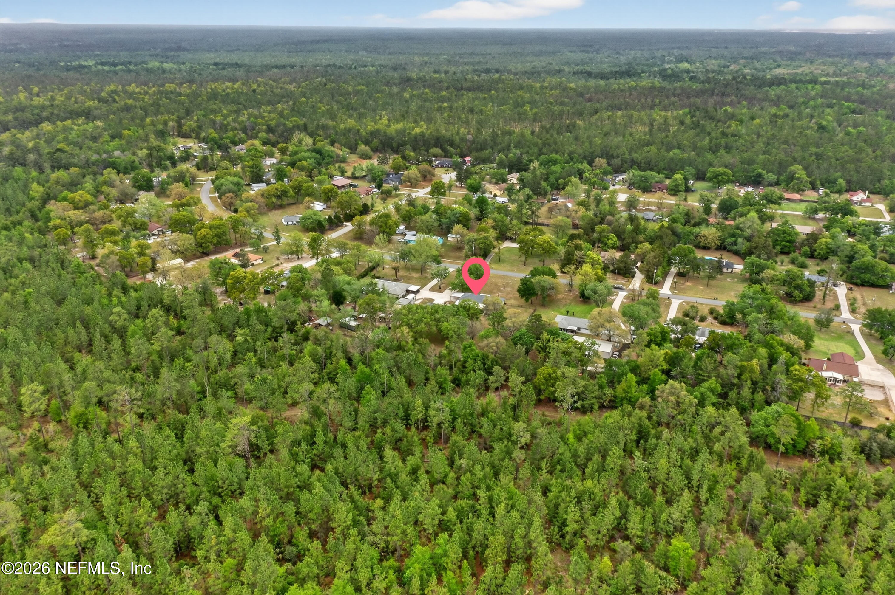 4537 Junction Drive Middleburg, FL 32068 - Photo 58 of 62 an aerial view of residential houses with outdoor space and trees