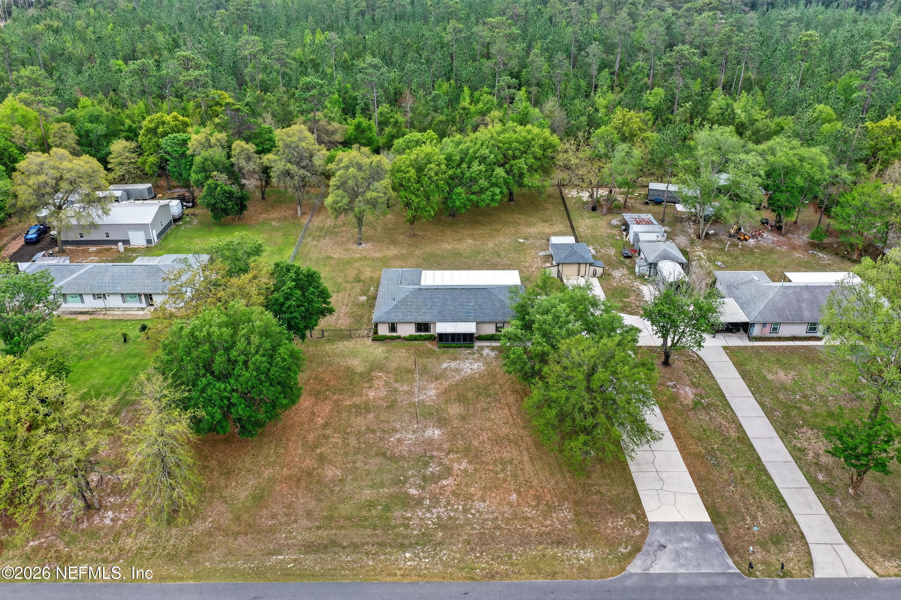 4537 Junction Drive Middleburg, FL 32068 - Photo 62 of 62 an aerial view of a house with a yard basket ball court and outdoor seating