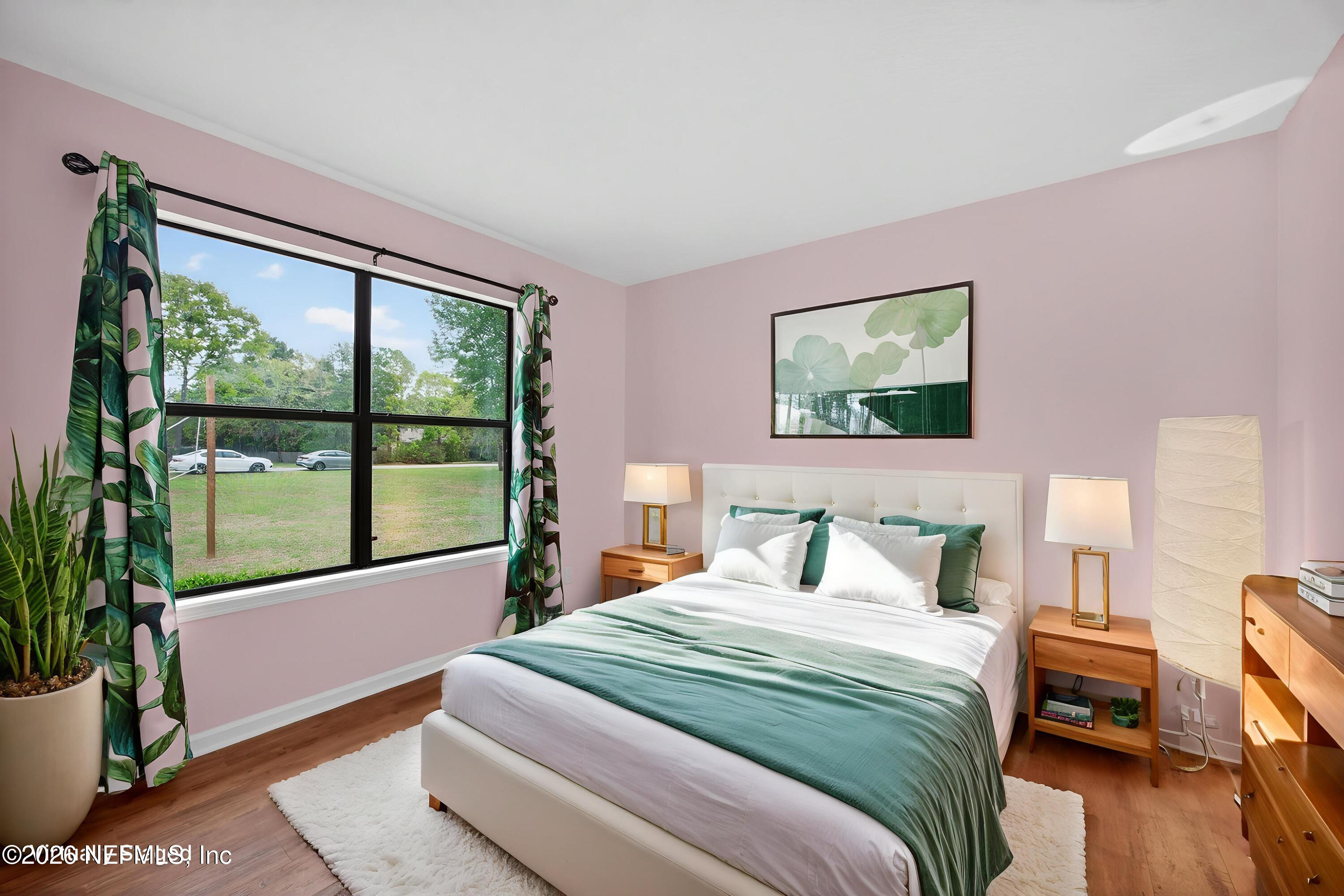 4537 Junction Drive Middleburg, FL 32068 - Photo 8 of 62 a bedroom with a bed and a large window