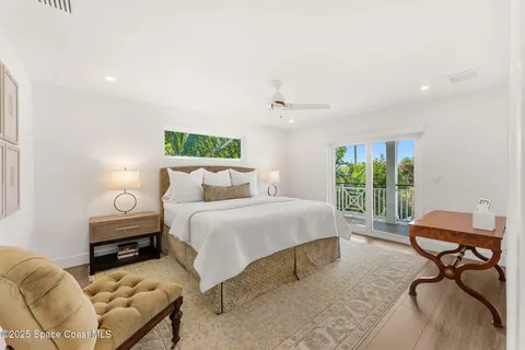 a view of balcony with wooden floor