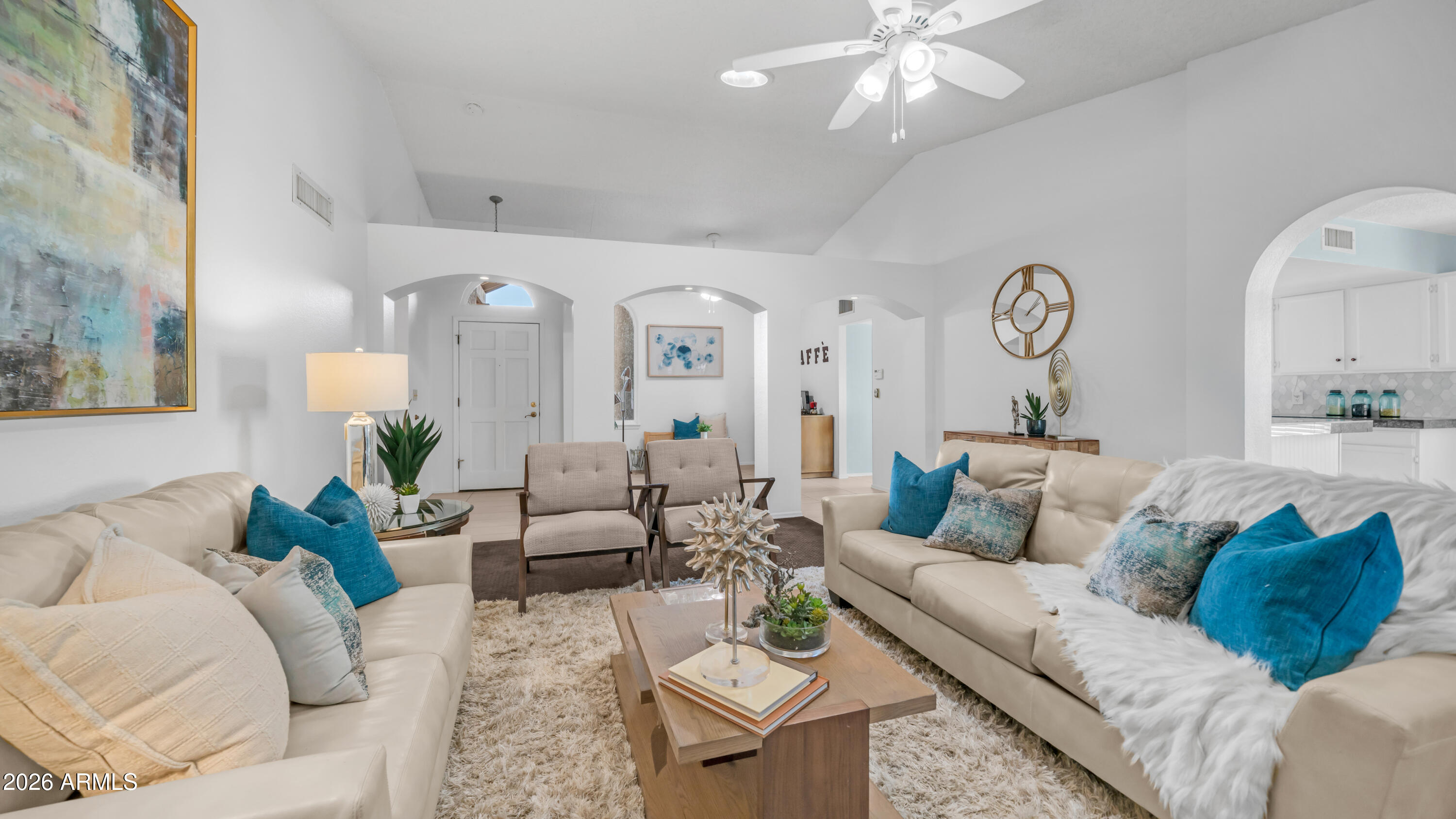 408 East Meadows Lane Gilbert, AZ 85234 - Photo 1 of 42 a living room with furniture and a chandelier
