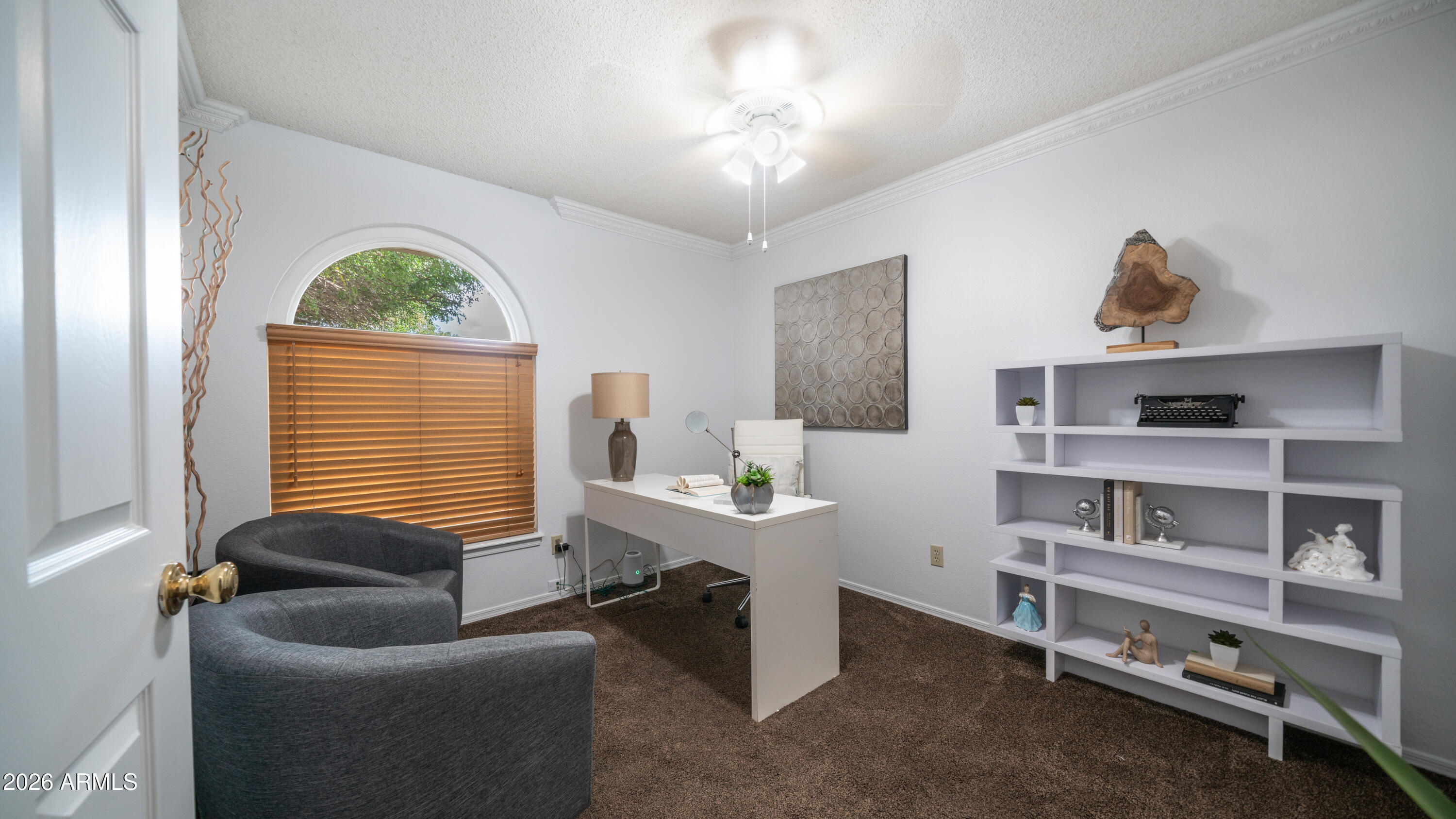408 East Meadows Lane Gilbert, AZ 85234 - Photo 18 of 42 a living room with furniture and a window