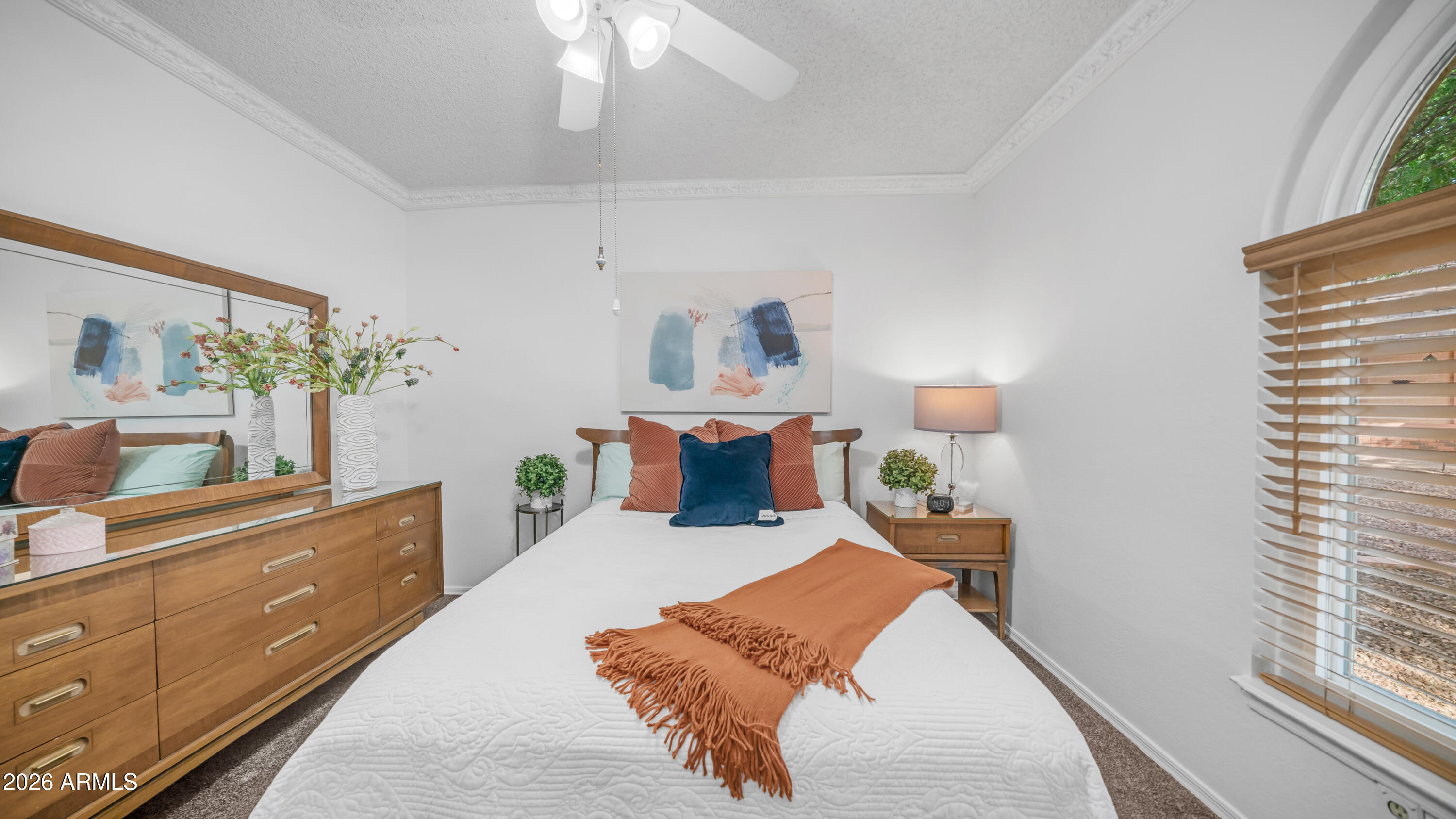 408 East Meadows Lane Gilbert, AZ 85234 - Photo 19 of 42 a bedroom with a bed and a dresser