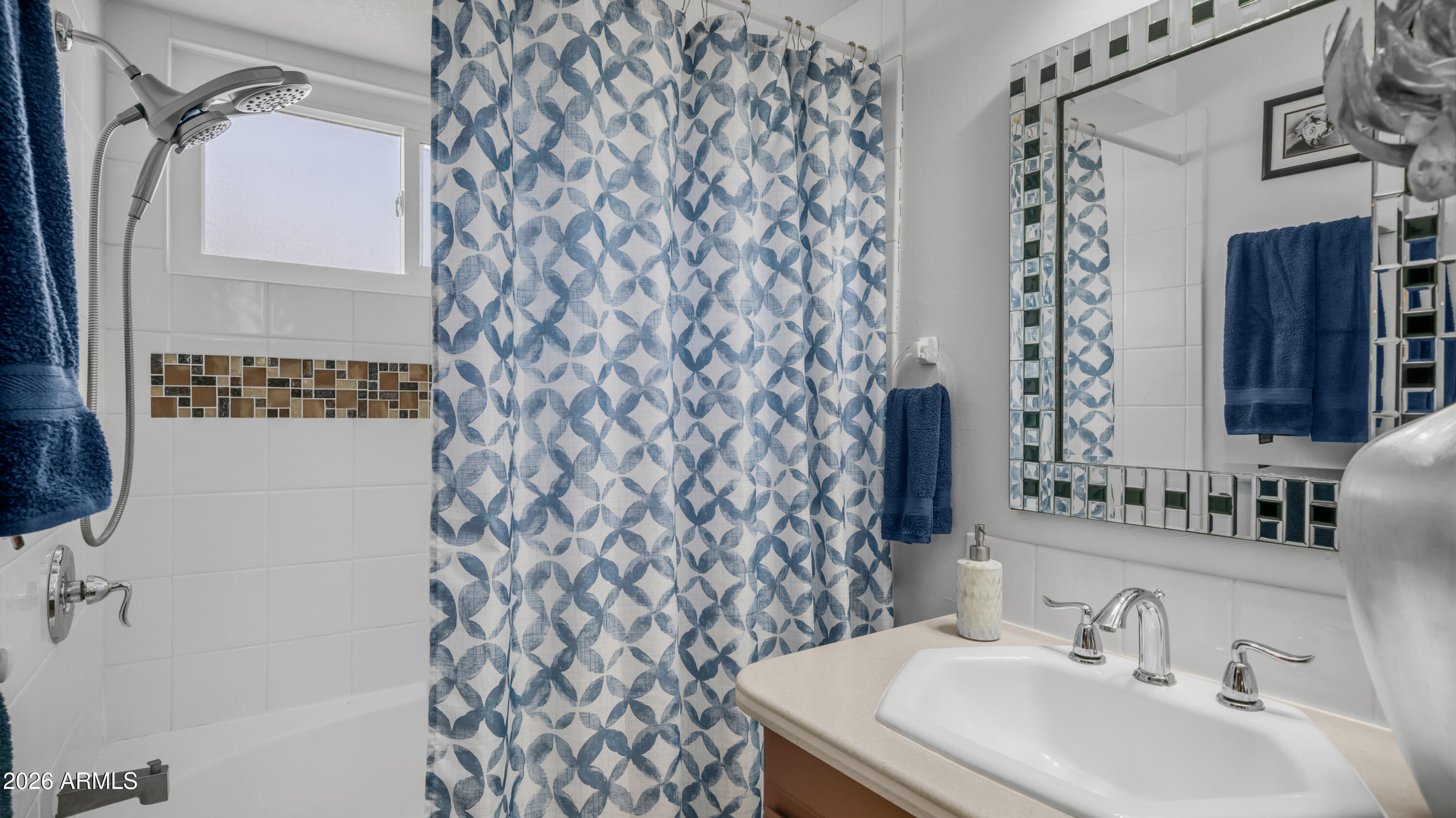 408 East Meadows Lane Gilbert, AZ 85234 - Photo 25 of 42 a bathroom with a sink toilet and shower