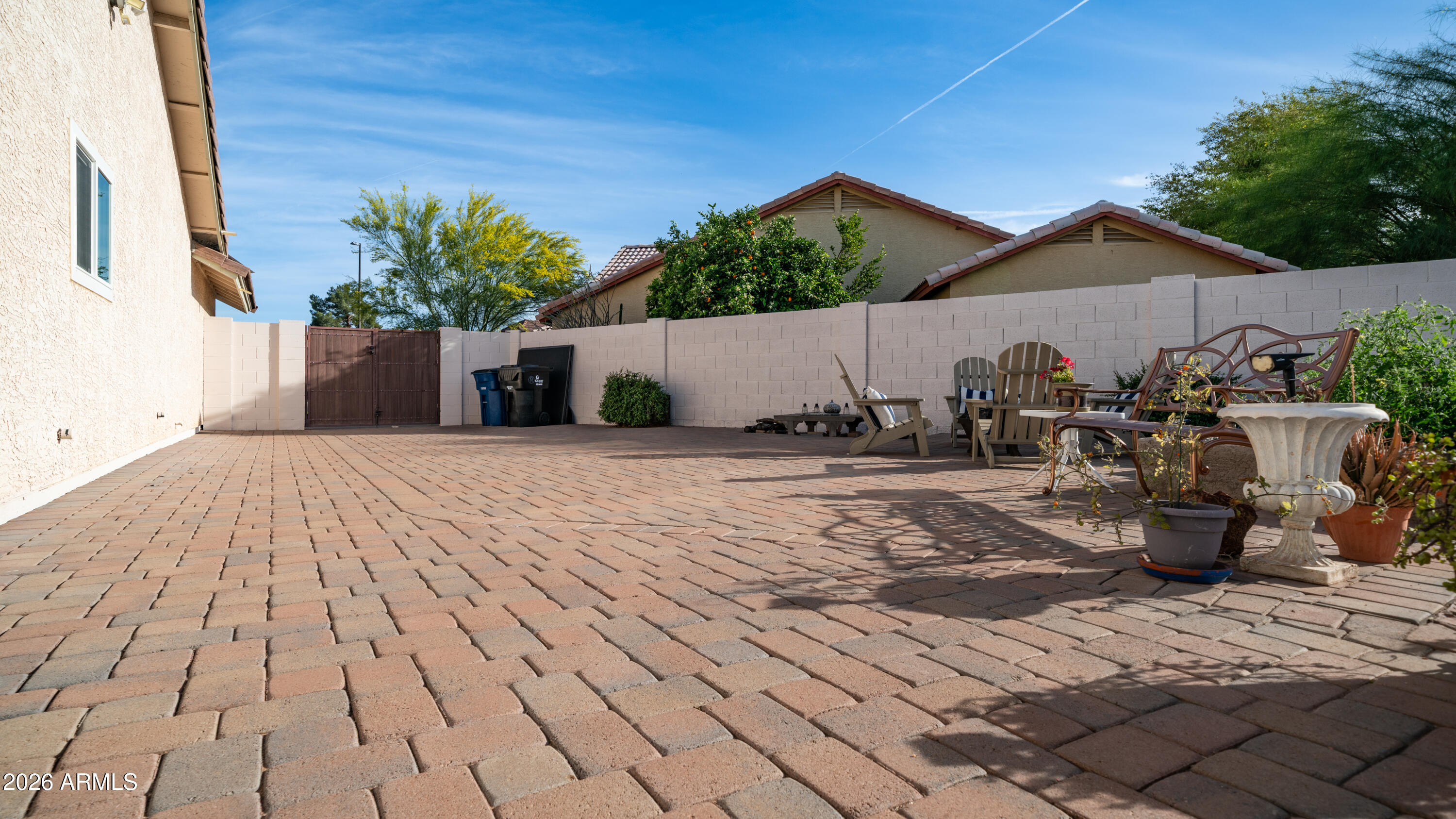 408 East Meadows Lane Gilbert, AZ 85234 - Photo 42 of 42 a view of a terrace with chairs