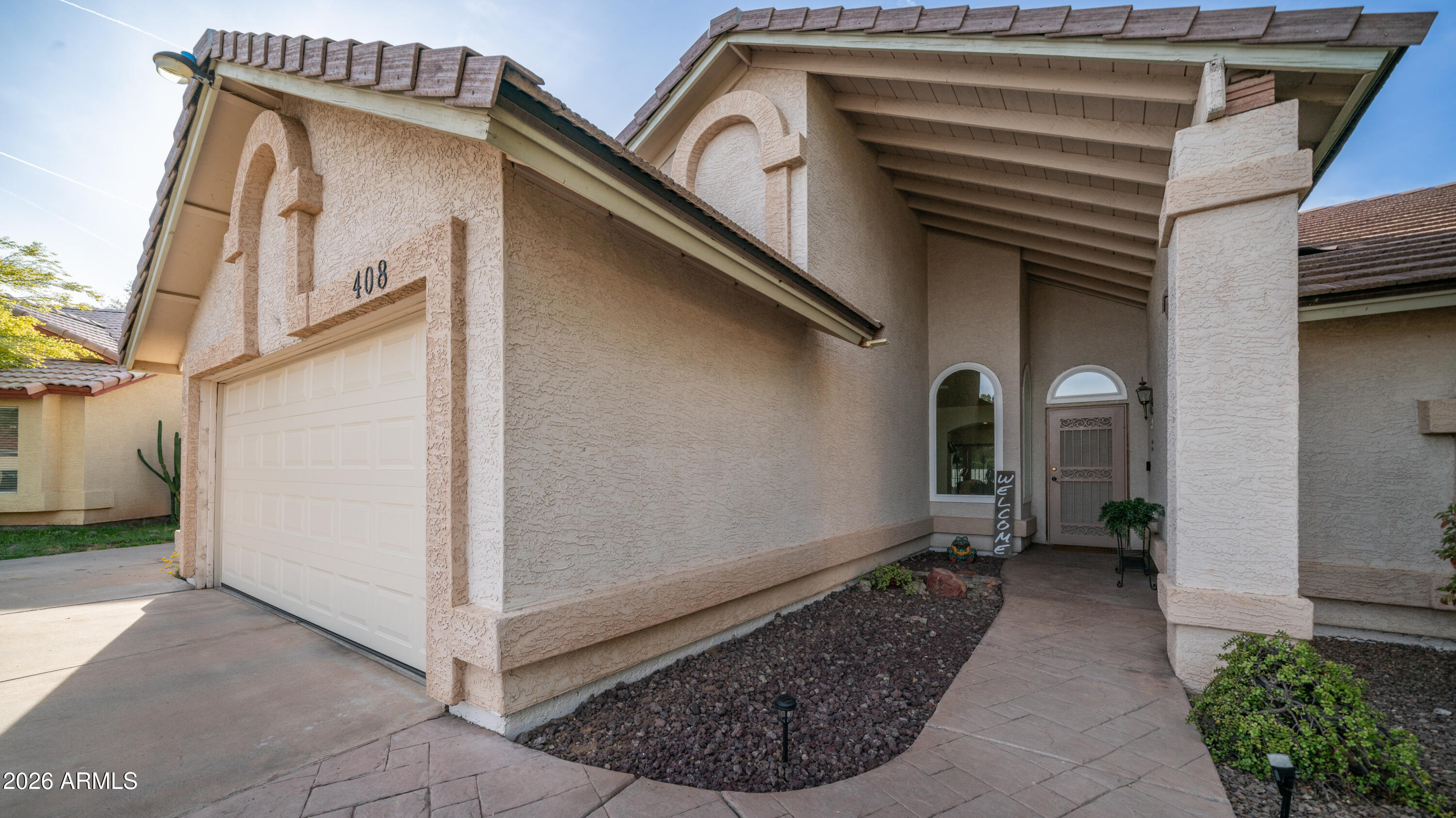 408 East Meadows Lane Gilbert, AZ 85234 - Photo 8 of 42 a view of front door of a house