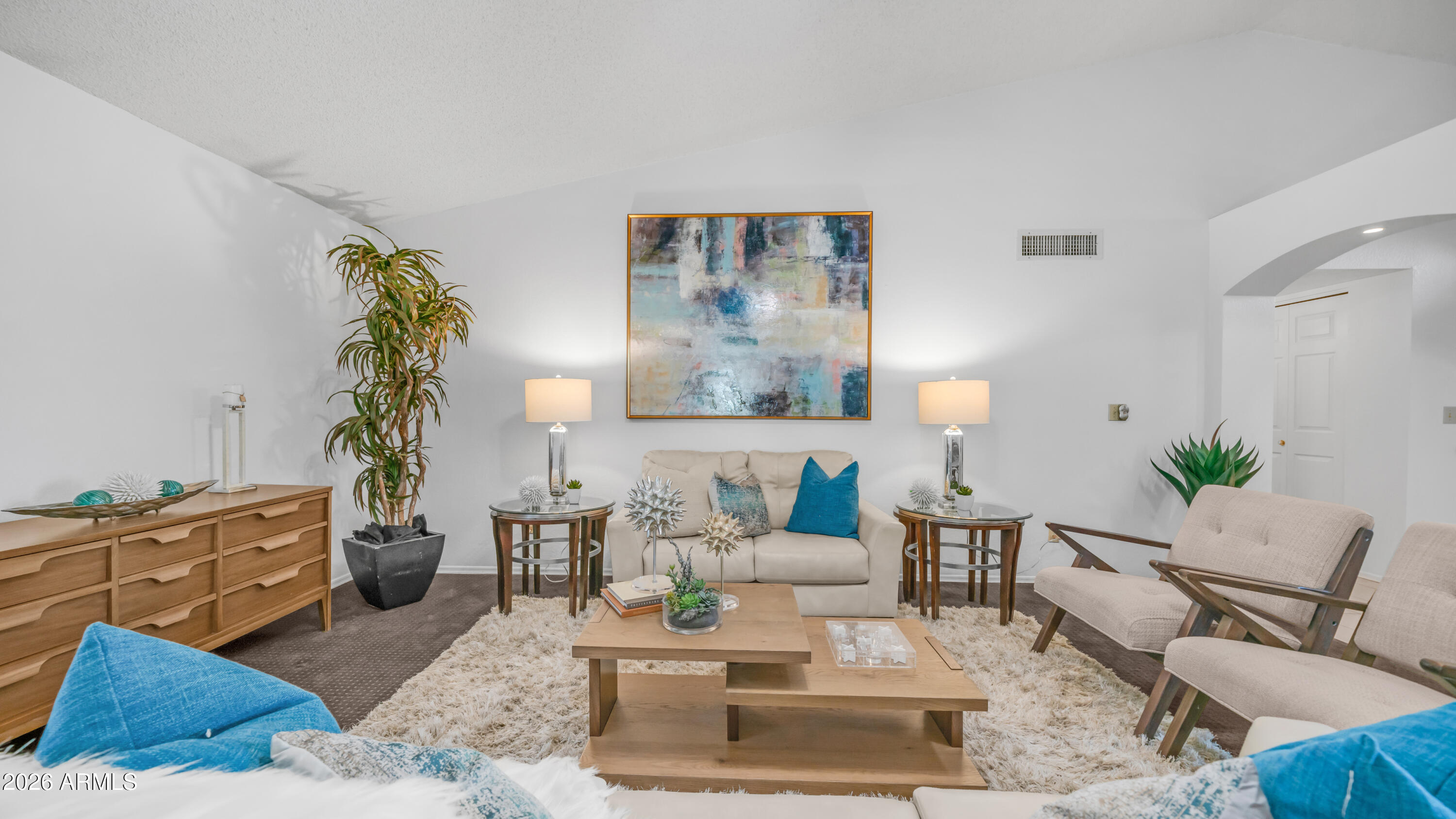408 East Meadows Lane Gilbert, AZ 85234 - Photo 9 of 42 a living room with furniture and wooden floor