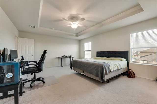 a bathroom with a sink double vanity and a mirror