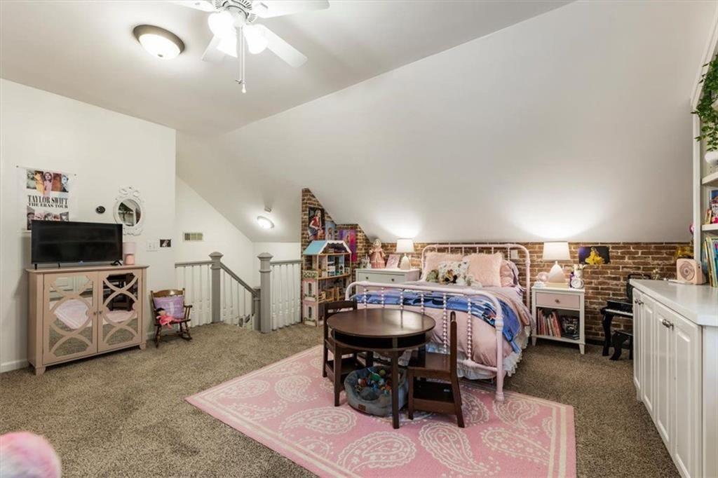 3910 Two Rivers Drive Cumming, GA 30041 - Photo 68 of 110 a view of a dining room with furniture and a kitchen