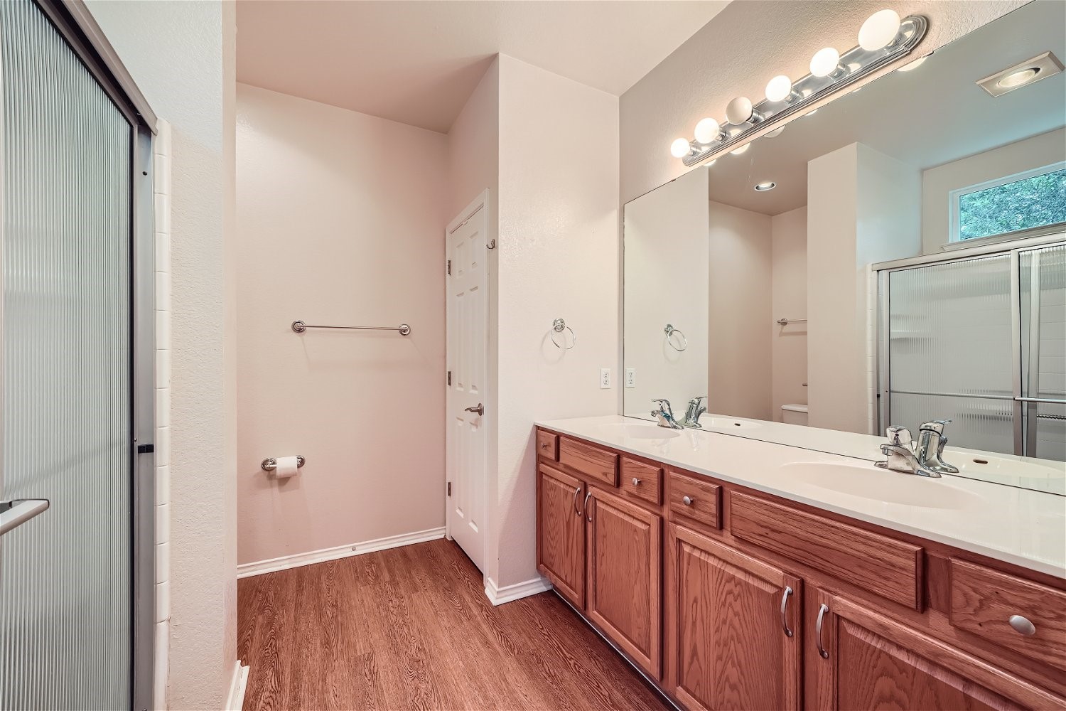 120 Muir Court Georgetown, TX 78633 - Photo 18 of 27 a spacious bathroom with a double vanity sink and a mirror