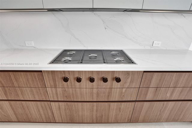 a close view of a utility room with washer and dryer