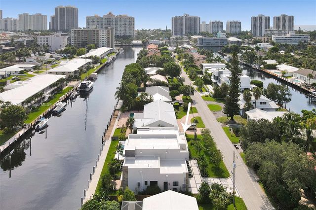 a view of a city with tall buildings
