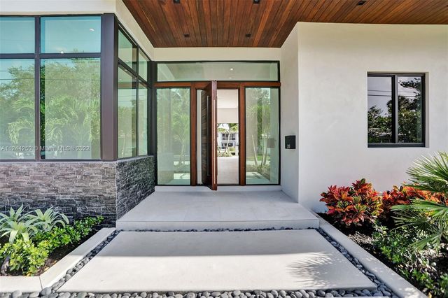 a front view of a house with a porch