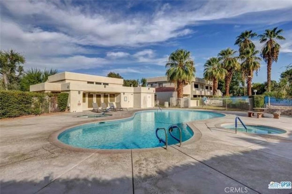 69646 Antonia Way Rancho Mirage, CA 92270 - Photo 48 of 50 a view of a swimming pool with a patio