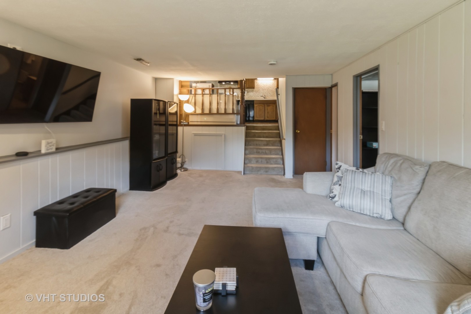 1942 Trail Ridge Street Arlington Heights, IL 60004 - Photo 12 of 29 a living room with furniture and a flat screen tv
