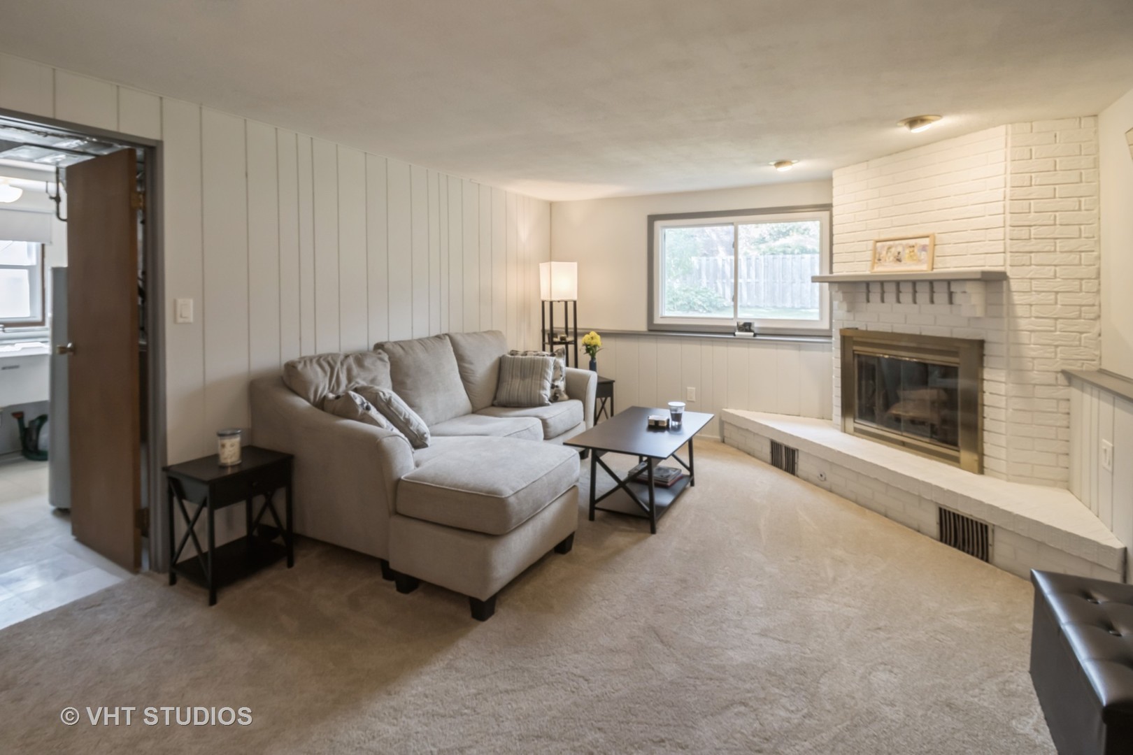 1942 Trail Ridge Street Arlington Heights, IL 60004 - Photo 13 of 29 a living room with furniture and a fireplace