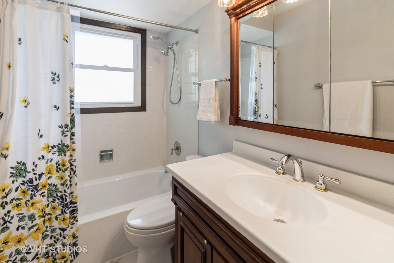 1942 Trail Ridge Street Arlington Heights, IL 60004 - Photo 21 of 29 a bathroom with a sink toilet vanity and shower