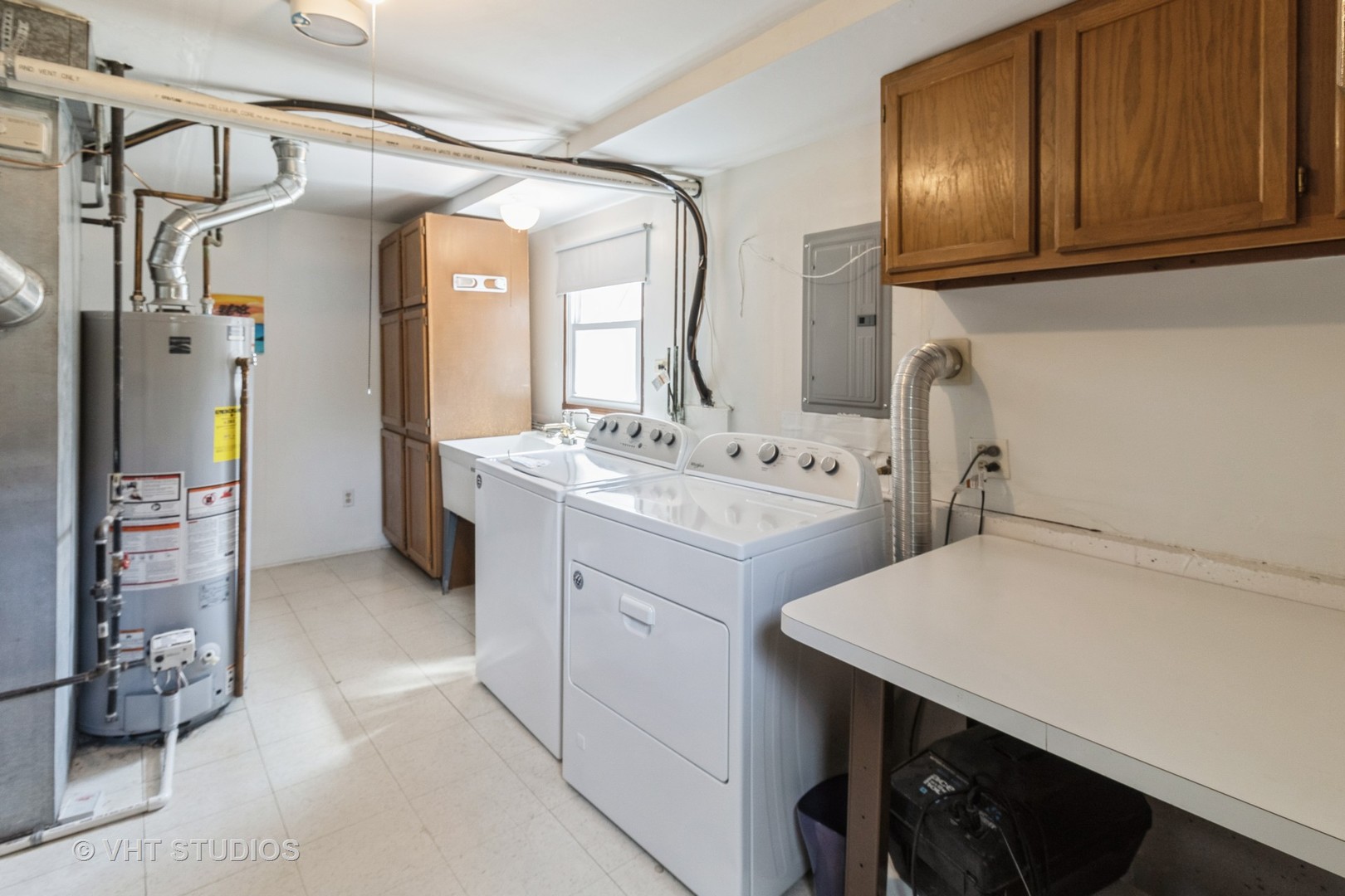1942 Trail Ridge Street Arlington Heights, IL 60004 - Photo 23 of 29 a utility room with cabinets