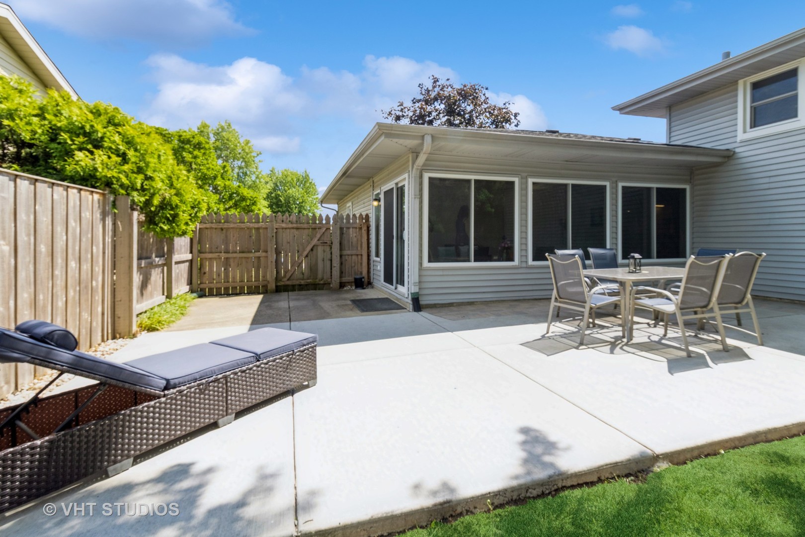 1942 Trail Ridge Street Arlington Heights, IL 60004 - Photo 24 of 29 a view of a patio with table and chairs and potted plants