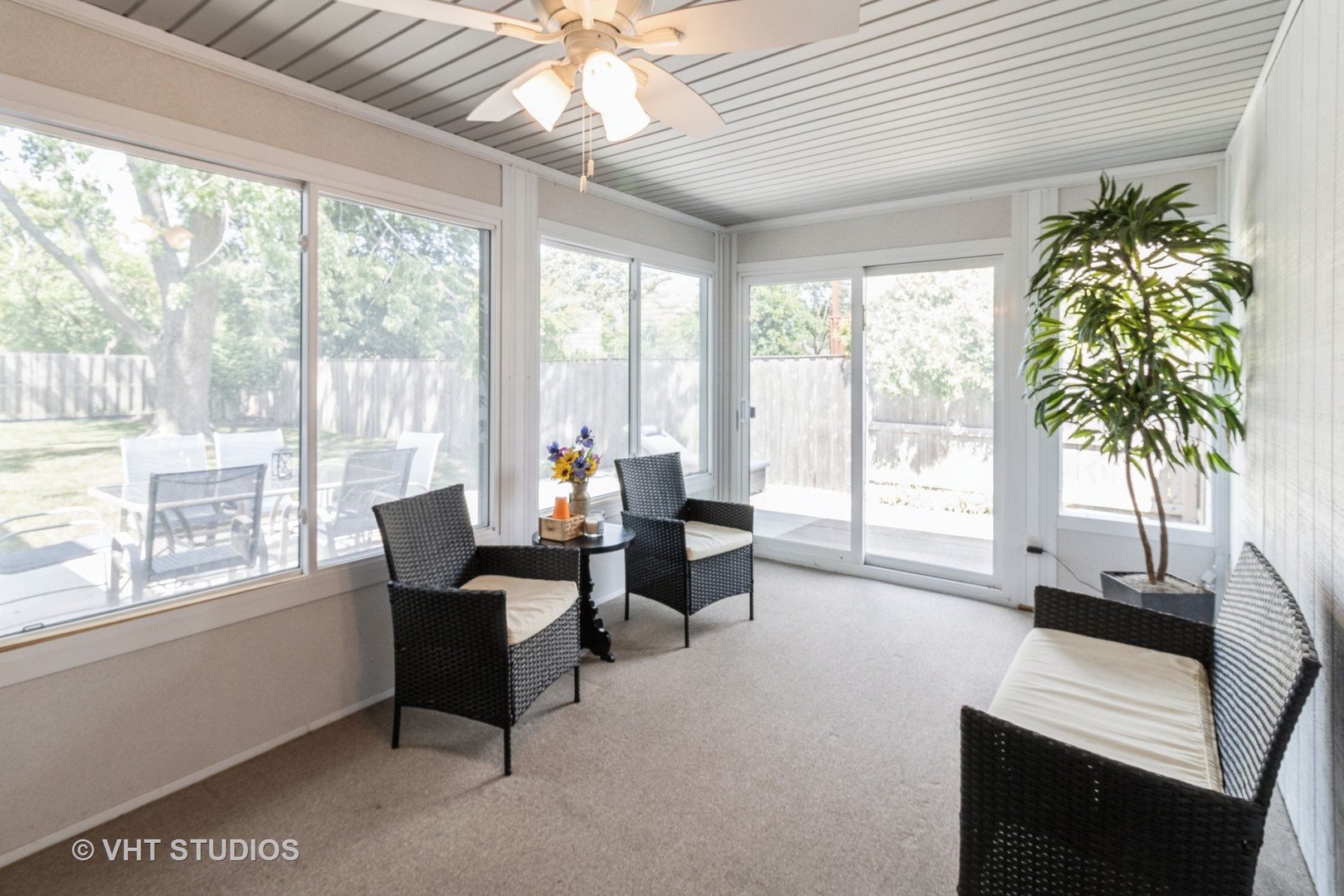 1942 Trail Ridge Street Arlington Heights, IL 60004 - Photo 9 of 29 a living room with furniture and a large window