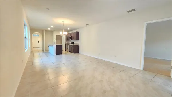 a view of a hallway with a chair