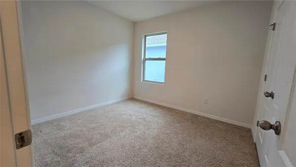 an empty room with a window