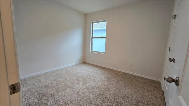 an empty room with a window