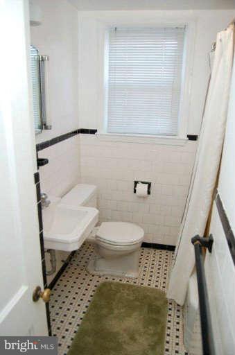 28 Cedar Knoll Road Cockeysville, MD 21030 - Photo 11 of 22 a bathroom with a toilet and a shower