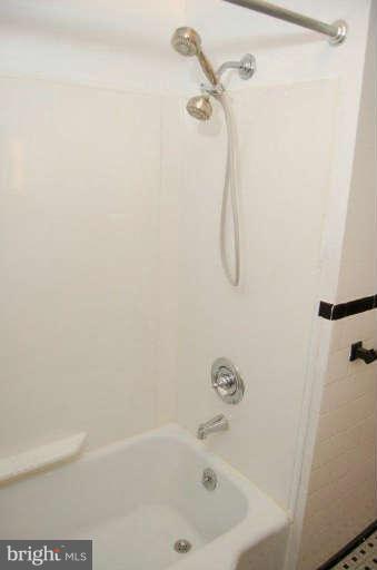 28 Cedar Knoll Road Cockeysville, MD 21030 - Photo 12 of 22 a bathroom with a bath tub with a shower