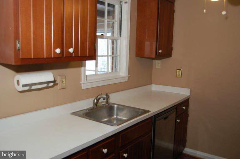 28 Cedar Knoll Road Cockeysville, MD 21030 - Photo 13 of 22 a kitchen with a sink cabinets and a window