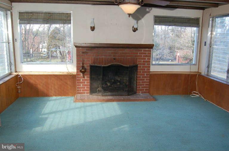 28 Cedar Knoll Road Cockeysville, MD 21030 - Photo 15 of 22 an empty room with windows and fireplace