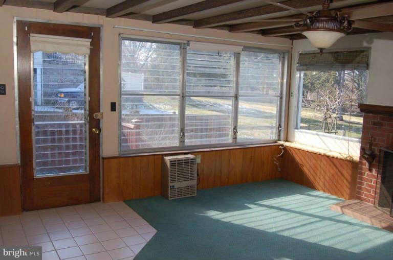 28 Cedar Knoll Road Cockeysville, MD 21030 - Photo 16 of 22 a view of an empty room with a window