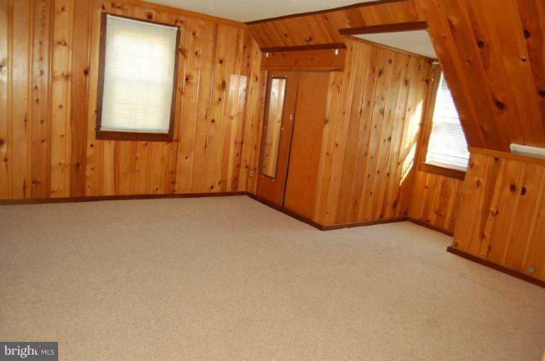 28 Cedar Knoll Road Cockeysville, MD 21030 - Photo 17 of 22 a view of an empty room with a window
