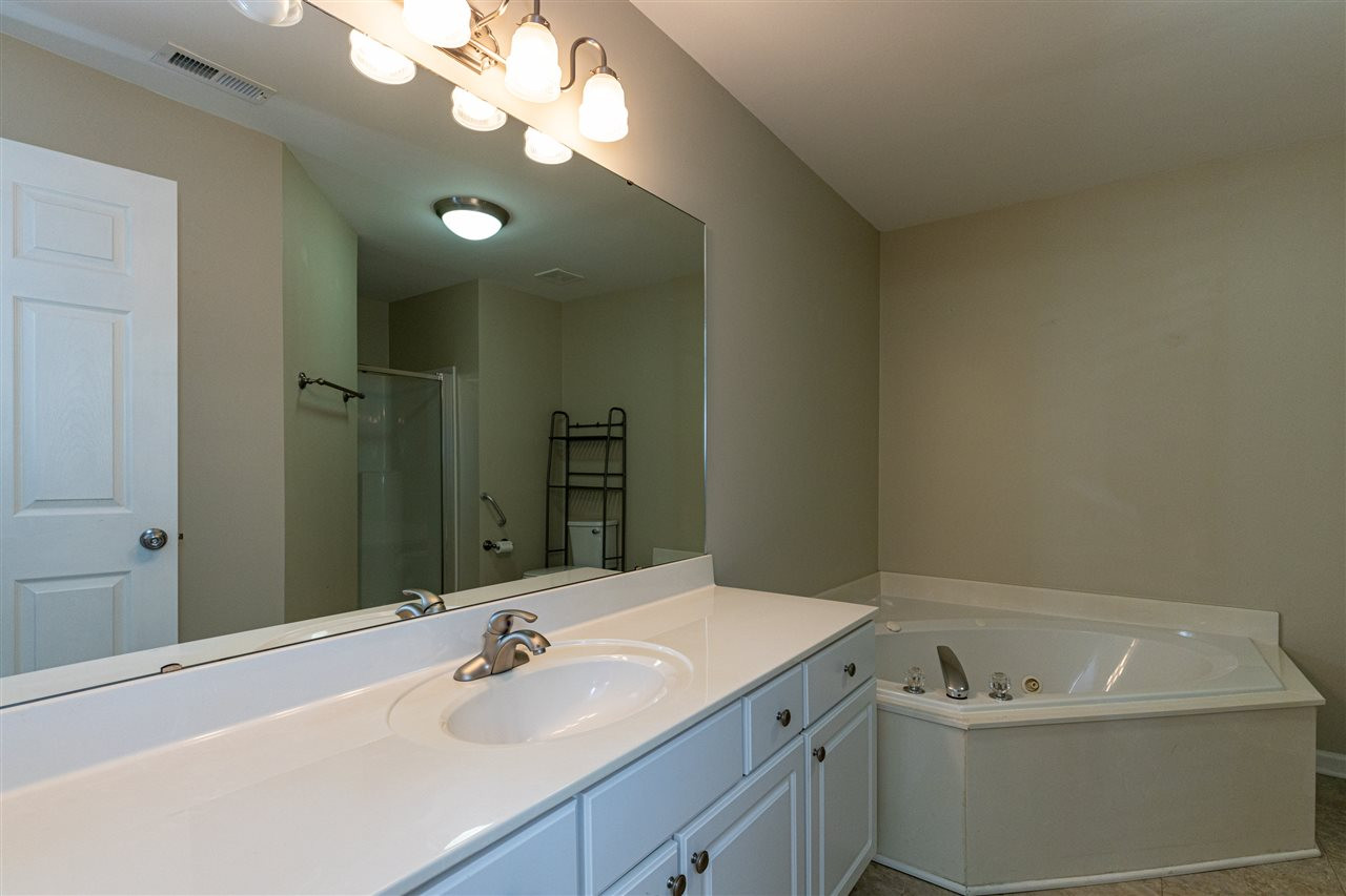3812 Wellington Ridge Loop, Unit 12 Cary, NC 27518 - Photo 18 of 30 Private bathroom includes tub and separate shower. Bathroom