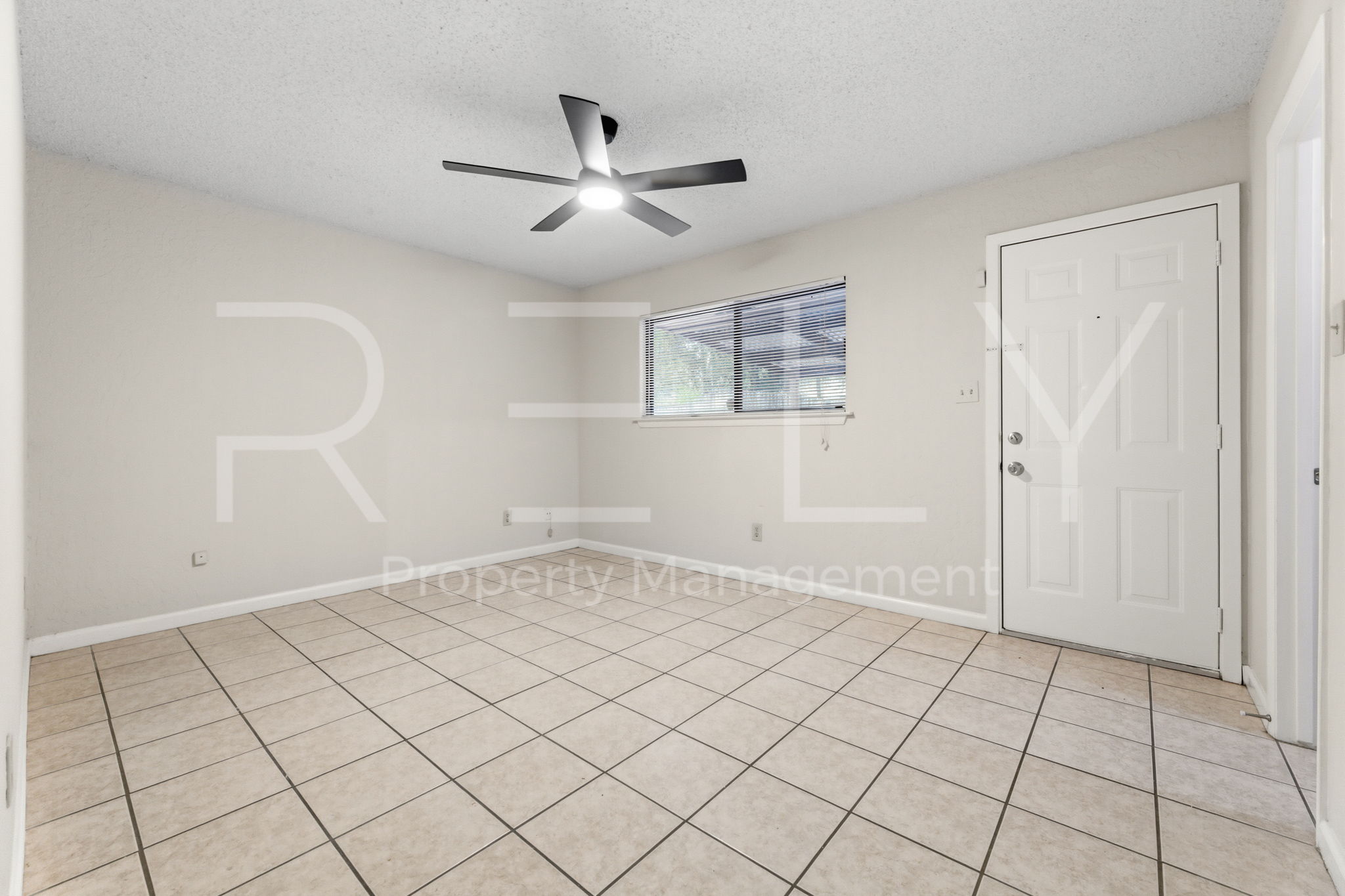 1005 Milford Way, Unit A Austin, TX 78745 - Photo 13 of 30 a view of an empty room and window
