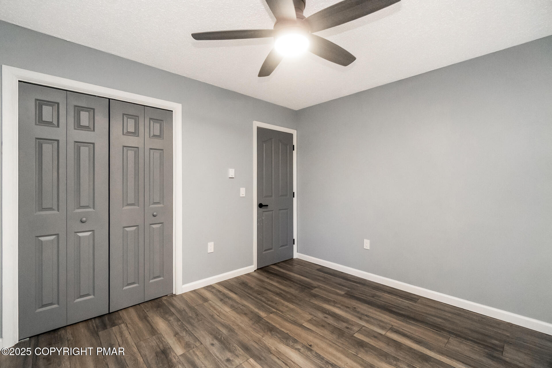 411 Alter Avenue Pocono Summit, PA 18346 - Photo 17 of 29 wooden floor in an empty room
