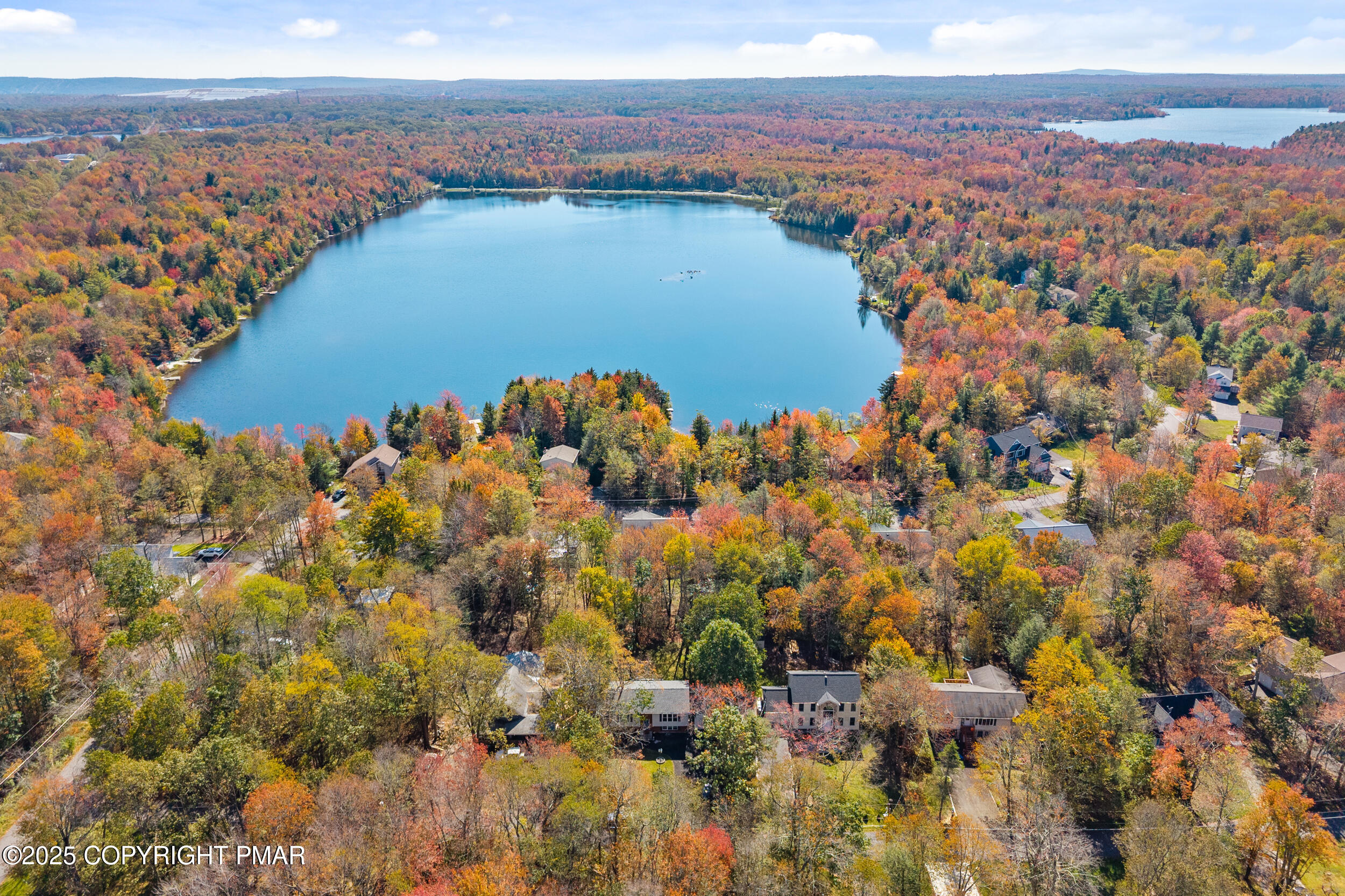 411 Alter Avenue Pocono Summit, PA 18346 - Photo 28 of 29 an aerial view of ocean and residential houses with outdoor space