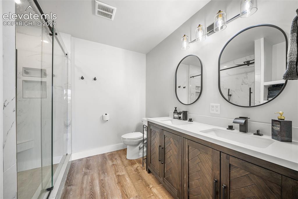 986 Apache Road Florissant, CO 80816 - Photo 16 of 50 Stylish primary ensuite with dual sinks