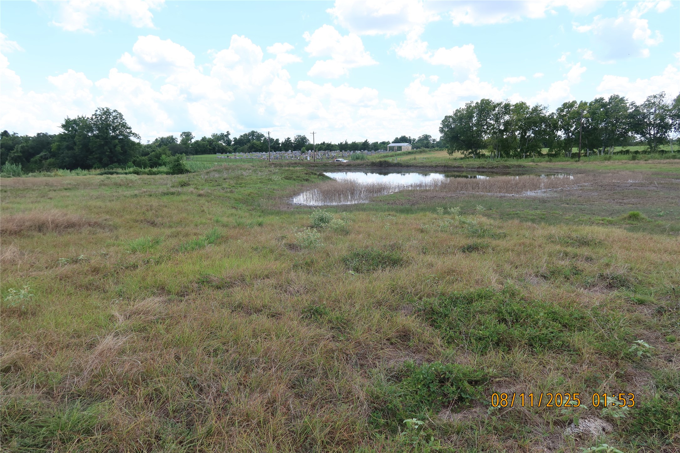 0 Sempronius Road Chappell Hill, TX 77426 - Photo 11 of 25 a view of a lake with houses in the background