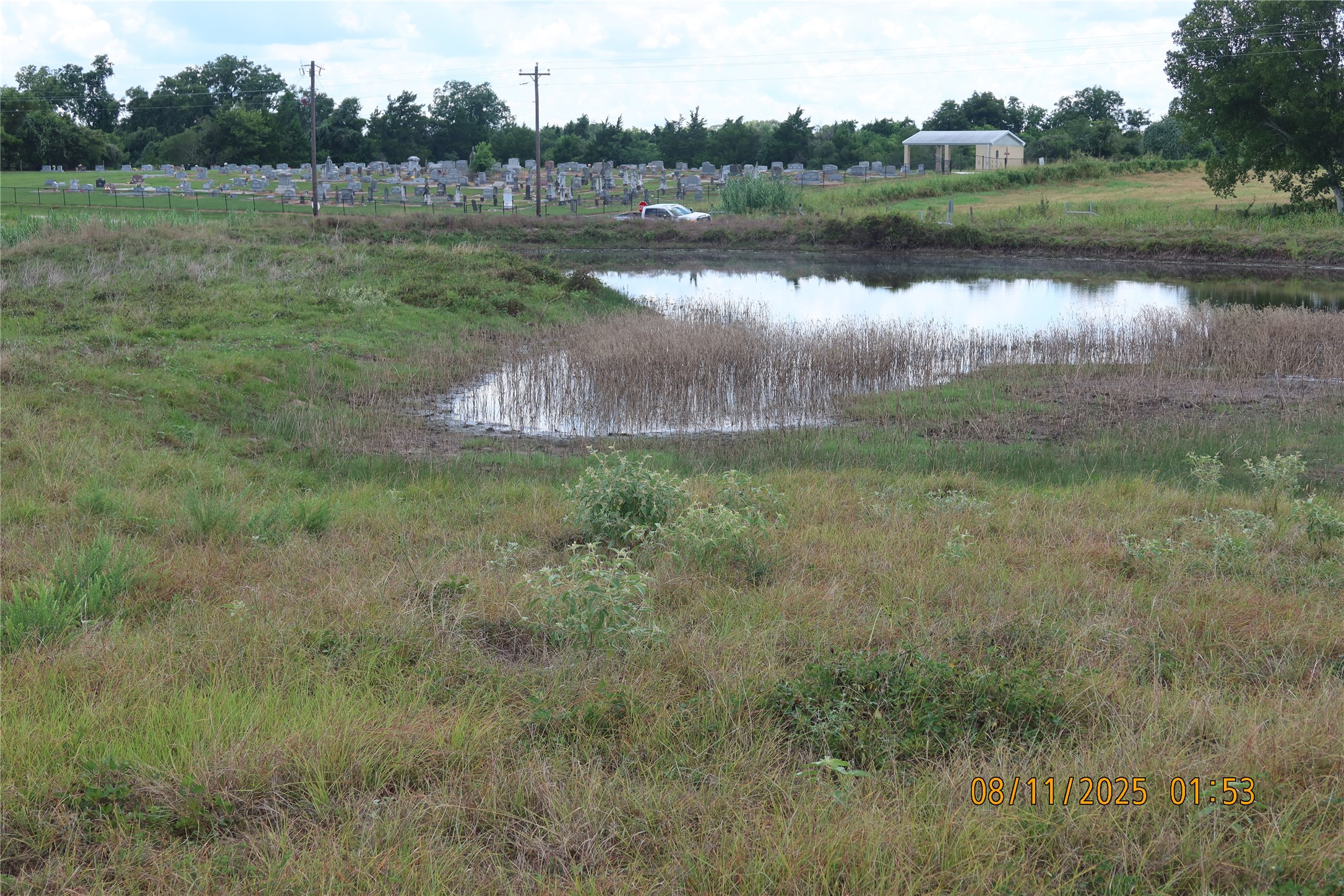 0 Sempronius Road Chappell Hill, TX 77426 - Photo 13 of 25 a view of a lake with houses in the back